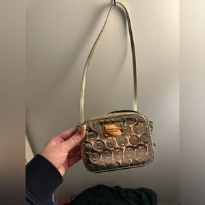 38. Gold Michael Kors Purse